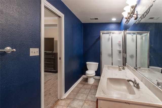10763 Nix Ln, Whitehouse, TX 75791 - bathroom with toilet, a shower stall, double vanity, and tile patterned floors