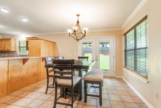 10763 Nix Ln, Whitehouse, TX 75791 - dining area featuring a chandelier, crown molding, light tile patterned floors, and french doors