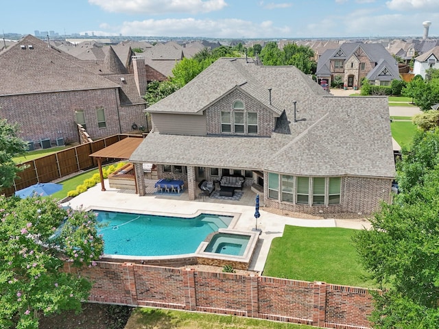 4158 Benchmark Ln, Frisco, TX 75034 - view of pool featuring an outdoor hangout area, a patio area, a pool with connected hot tub, and a residential view
