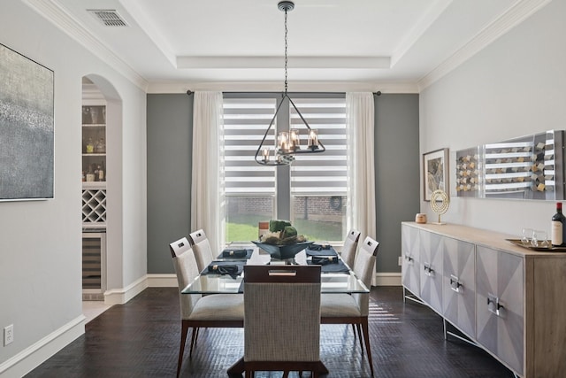 4158 Benchmark Ln, Frisco, TX 75034 - dining room featuring a tray ceiling, wine cooler, plenty of natural light, and ornamental molding