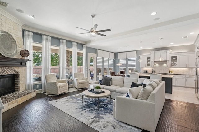 4158 Benchmark Ln, Frisco, TX 75034 - living area with a ceiling fan, a large fireplace, and recessed lighting