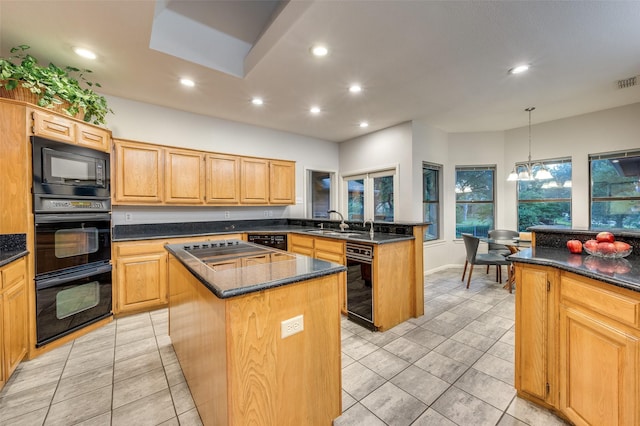2308 Aberdeen Bnd, Carrollton, TX 75007 - kitchen featuring black appliances, a kitchen island, recessed lighting, light tile patterned flooring, and a peninsula