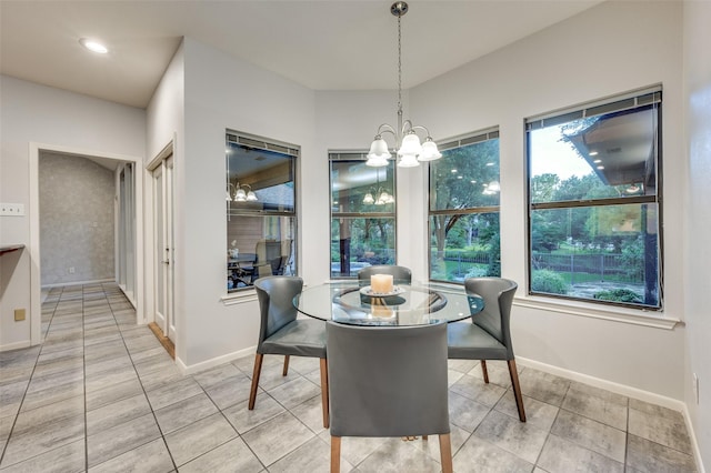 2308 Aberdeen Bnd, Carrollton, TX 75007 - dining space featuring a chandelier, light tile patterned flooring, and recessed lighting