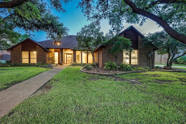 2308 Aberdeen Bnd, Carrollton, TX 75007 - view of front of house featuring brick siding and a front lawn