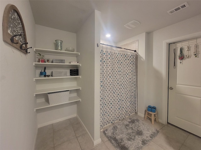 3400 Quiet Valley Rd, Fort Worth, TX 76123 - bathroom featuring tile patterned floors, curtained shower, and baseboards