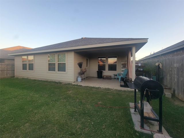 3400 Quiet Valley Rd, Fort Worth, TX 76123 - back of house at dusk with a patio area