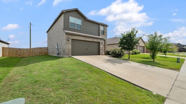 408 Micah Ln, Ferris, TX 75125 - traditional-style house featuring a garage, driveway, brick siding, and a gate