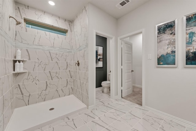 3445 Cross Shore Dr, Anna, TX 75409 - bathroom with toilet, a tile shower, marble finish floors, baseboards, and recessed lighting