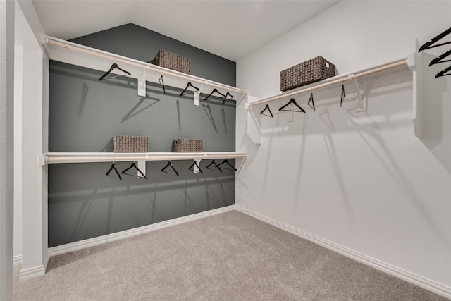 3445 Cross Shore Dr, Anna, TX 75409 - walk in closet featuring carpet flooring and vaulted ceiling