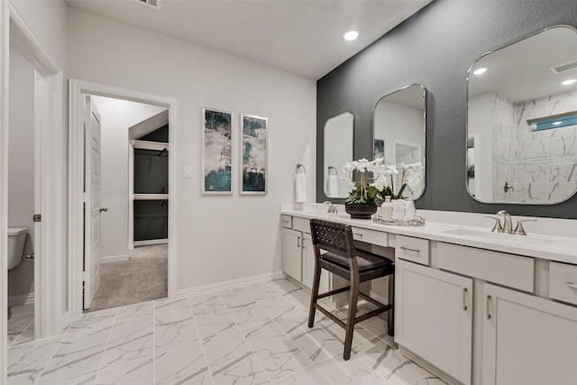 3445 Cross Shore Dr, Anna, TX 75409 - bathroom with double vanity, marble look tile flooring, toilet, baseboards, and a shower