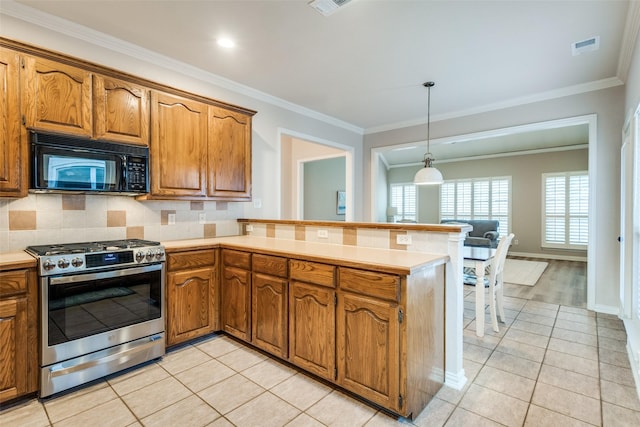 1908 Thompson Ct, Flower Mound, TX 75028 - kitchen featuring stainless steel gas range, black microwave, a peninsula, light tile patterned flooring, and brown cabinets