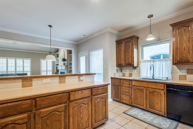 1908 Thompson Ct, Flower Mound, TX 75028 - kitchen featuring black dishwasher, decorative light fixtures, decorative backsplash, light countertops, and crown molding