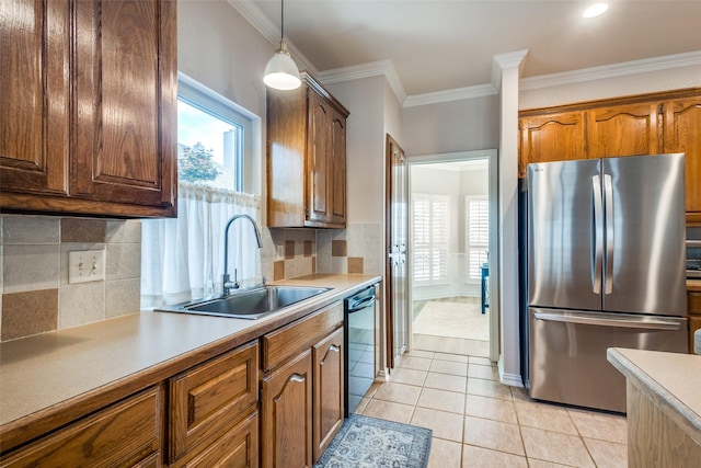 1908 Thompson Ct, Flower Mound, TX 75028 - kitchen featuring freestanding refrigerator, dishwasher, healthy amount of natural light, light countertops, and crown molding