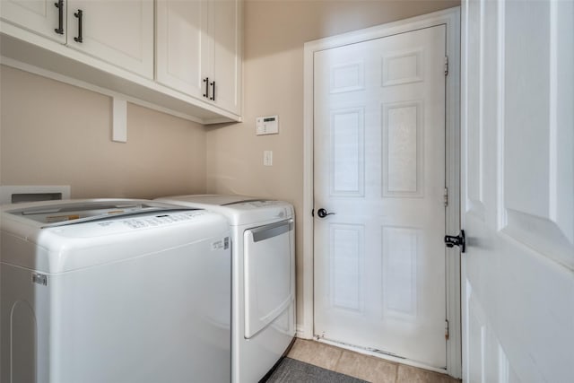 1908 Thompson Ct, Flower Mound, TX 75028 - laundry area with cabinet space and washer and clothes dryer