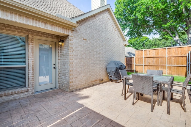 1908 Thompson Ct, Flower Mound, TX 75028 - view of patio / terrace with area for grilling and outdoor dining space