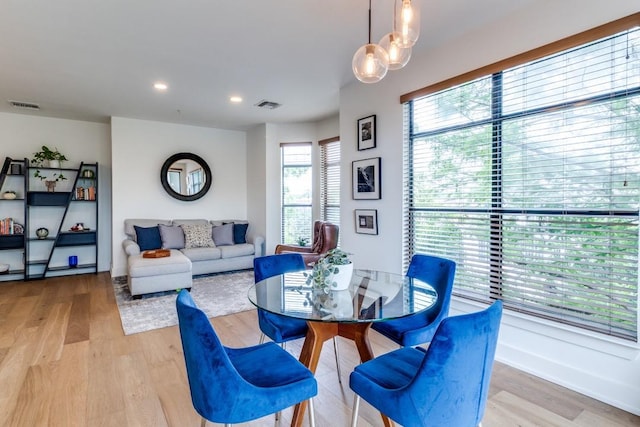 4333 Gilbert Ave Unit 329, Dallas, TX 75219 - dining space featuring light wood-style flooring and recessed lighting