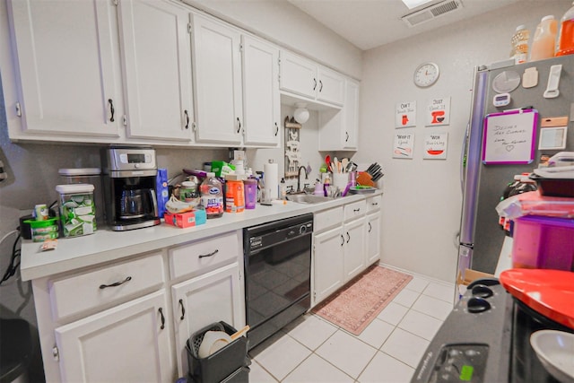 675 Harbor Dr N, Azle, TX 76020 - kitchen with black dishwasher, a sink, light countertops, and white cabinetry