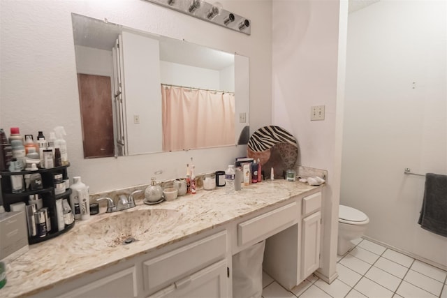 675 Harbor Dr N, Azle, TX 76020 - full bath featuring toilet, vanity, and tile patterned floors