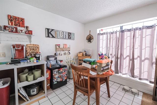 675 Harbor Dr N, Azle, TX 76020 - dining space featuring a textured ceiling and light tile patterned floors