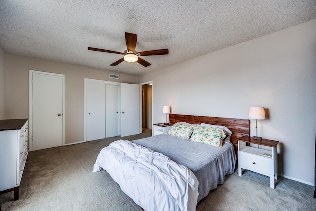 12834 Midway Rd Unit 1105, Dallas, TX 75244 - carpeted bedroom featuring a ceiling fan and a textured ceiling