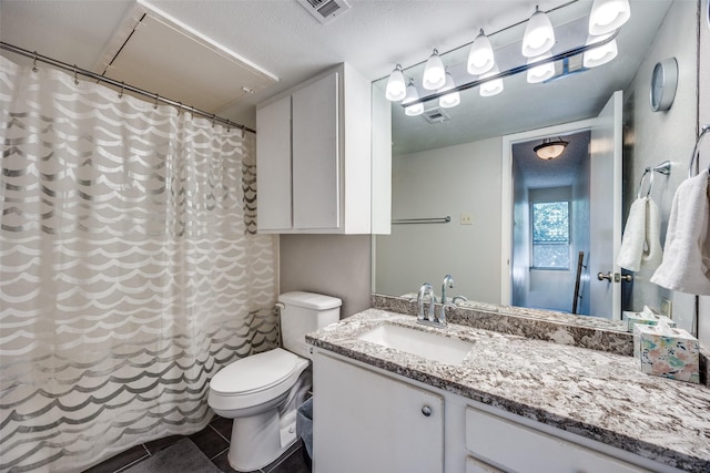 12834 Midway Rd Unit 1105, Dallas, TX 75244 - bathroom featuring toilet, vanity, tile patterned flooring, and a shower with shower curtain