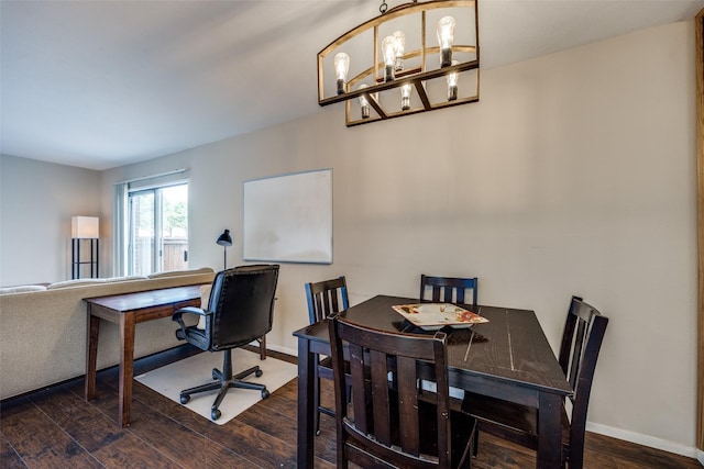 12834 Midway Rd Unit 1105, Dallas, TX 75244 - dining area featuring wood finished floors, baseboards, and a chandelier