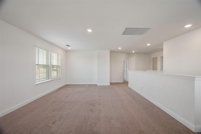 4224 Wood River Trl, Prosper, TX 75078 - empty room with recessed lighting, baseboards, light carpet, and attic access