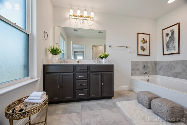 4224 Wood River Trl, Prosper, TX 75078 - full bathroom with double vanity, tile patterned floors, a bath, baseboards, and recessed lighting
