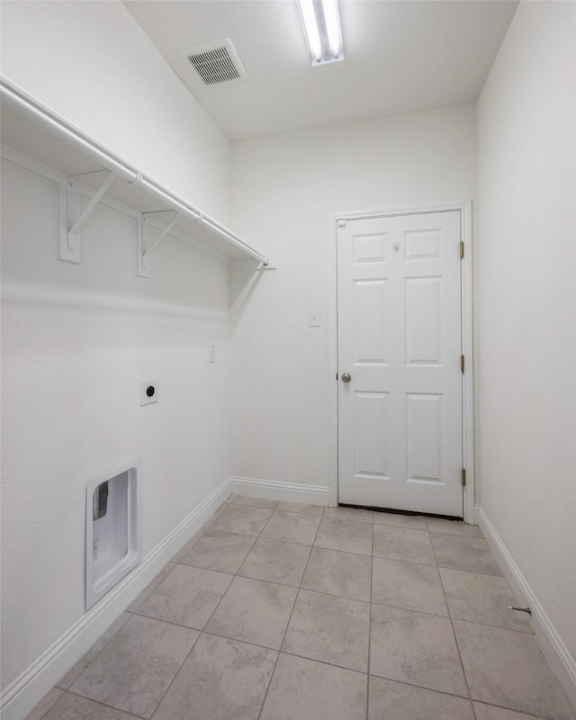 4224 Wood River Trl, Prosper, TX 75078 - laundry room featuring hookup for an electric dryer, light tile patterned flooring, and baseboards