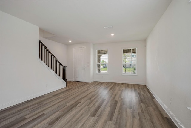 4224 Wood River Trl, Prosper, TX 75078 - foyer with wood finished floors, stairs, baseboards, and recessed lighting