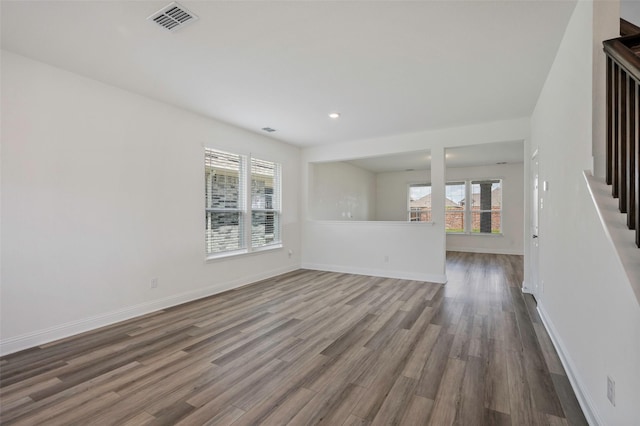 4224 Wood River Trl, Prosper, TX 75078 - unfurnished living room featuring wood finished floors, baseboards, and recessed lighting