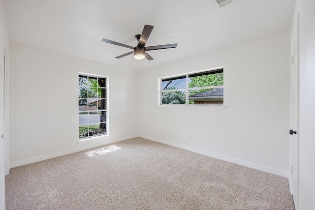 6509 S Hulen St, Fort Worth, TX 76133 - spare room with plenty of natural light, carpet flooring, baseboards, and ceiling fan