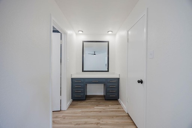 6509 S Hulen St, Fort Worth, TX 76133 - bathroom featuring vanity, wood finished floors, and baseboards