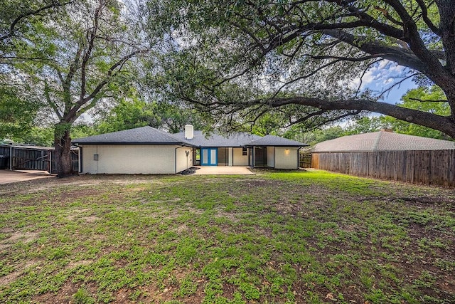 6509 S Hulen St, Fort Worth, TX 76133 - back of property featuring a chimney