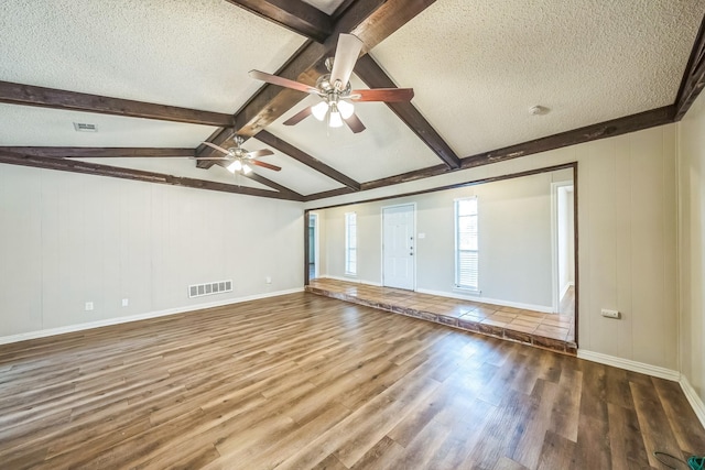 715 San Juan Dr, Duncanville, TX 75116 - unfurnished room featuring wood finished floors, a textured ceiling, baseboards, and a ceiling fan