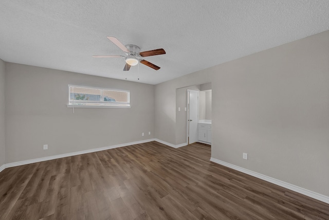 715 San Juan Dr, Duncanville, TX 75116 - empty room with dark wood-style floors, ceiling fan, a textured ceiling, and baseboards