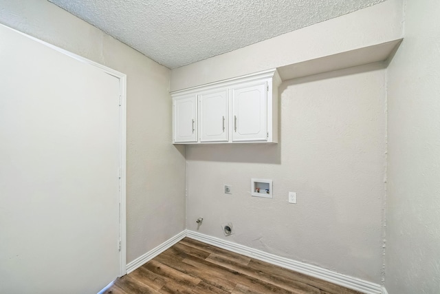 715 San Juan Dr, Duncanville, TX 75116 - washroom featuring dark wood finished floors, hookup for an electric dryer, gas dryer hookup, baseboards, and washer hookup