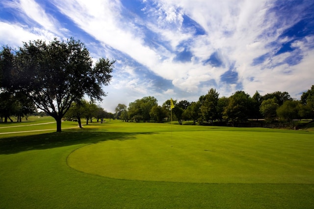 5024 Magnolia Cir, Addison, TX 75001 - surrounding community with golf course view and view of wooded area