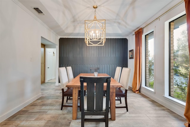 8608 Funtier Ct, Fort Worth, TX 76179 - dining room with a chandelier, light wood finished floors, ornamental molding, and baseboards