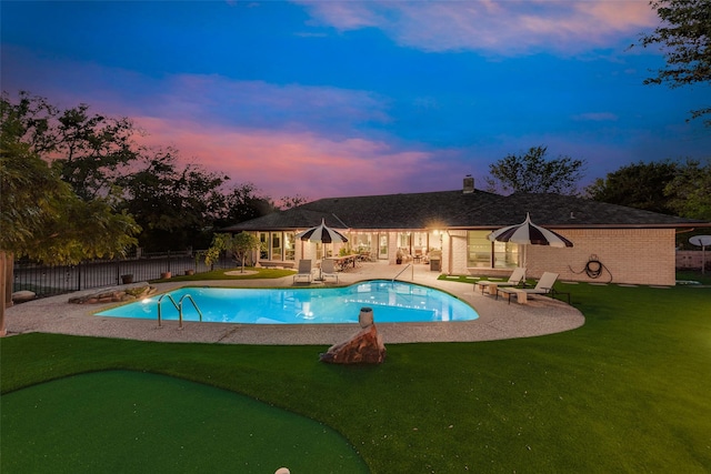 8608 Funtier Ct, Fort Worth, TX 76179 - pool at dusk with a putting green and a patio area