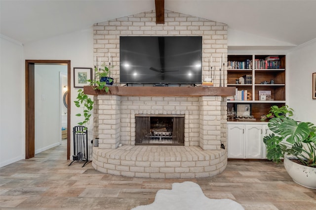 8608 Funtier Ct, Fort Worth, TX 76179 - living room featuring vaulted ceiling, wood finished floors, a brick fireplace, and baseboards