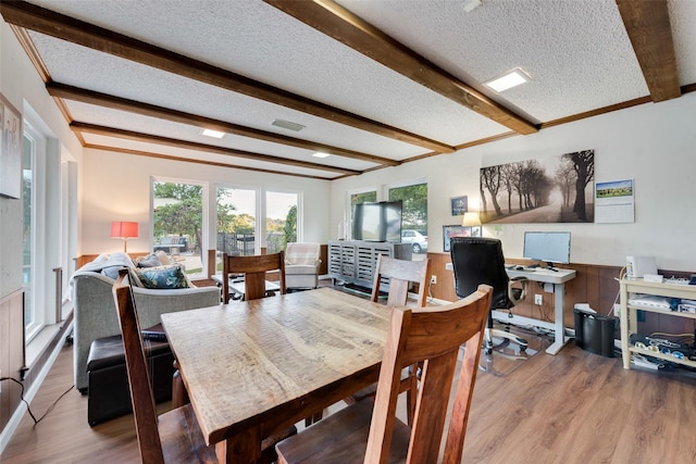8608 Funtier Ct, Fort Worth, TX 76179 - dining room with wood finished floors, beam ceiling, a textured ceiling, and an office area