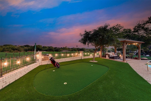 8608 Funtier Ct, Fort Worth, TX 76179 - view of community with an area to practice putting, an outdoor hangout area, a fenced backyard, and a patio area