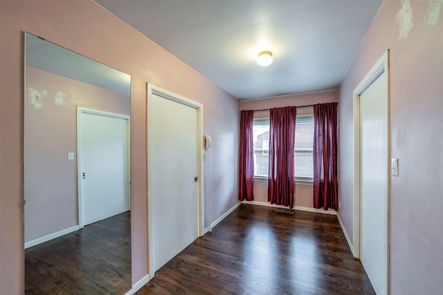 612 W Simmons St, Weatherford, TX 76086 - unfurnished room featuring wood finished floors and baseboards