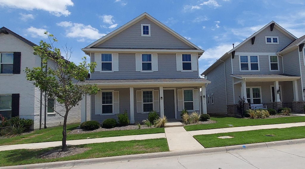913 E Market Sq, Northlake, TX 76247 - view of front facade featuring a porch and a front yard