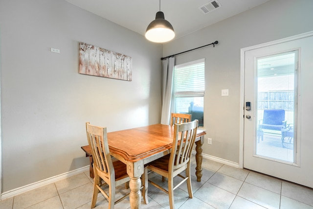 5604 Durst Ln, Forney, TX 75126 - dining room featuring light tile patterned floors and baseboards