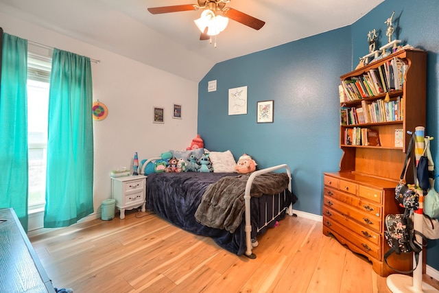 5604 Durst Ln, Forney, TX 75126 - bedroom with vaulted ceiling, wood finished floors, a ceiling fan, and baseboards