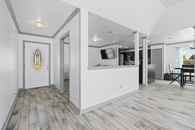 2600 Dave Angel Rd, Burleson, TX 76028 - foyer entrance featuring ornamental molding, light wood-style flooring, and decorative columns