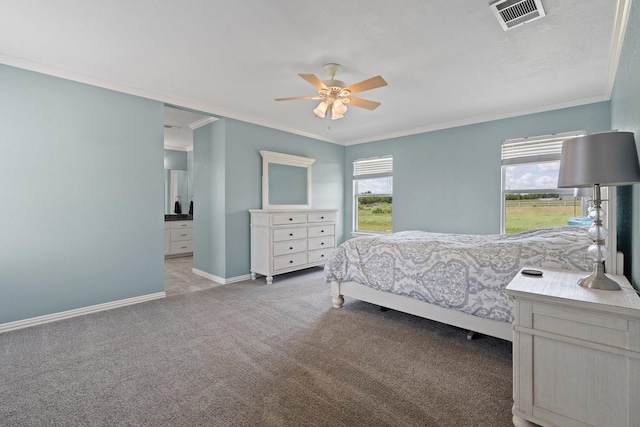 2600 Dave Angel Rd, Burleson, TX 76028 - carpeted bedroom with multiple windows, crown molding, ensuite bath, and a ceiling fan