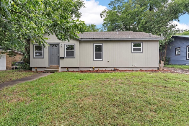 1024 N 45th St, Waco, TX 76710 - ranch-style house featuring a front yard, entry steps, and roof with shingles